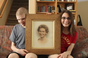 The kids posing with their grandma.  