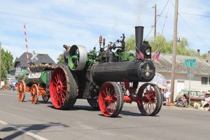 Before the parade even started this wood burning steam engine slowly made it's way along the route