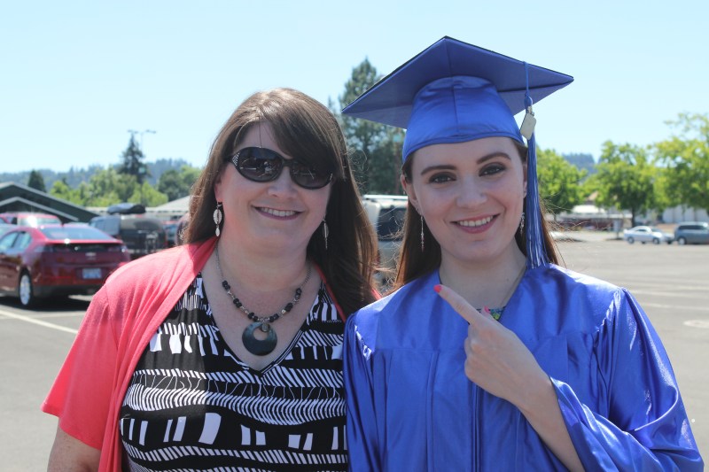 The graduate with her mama/teacher