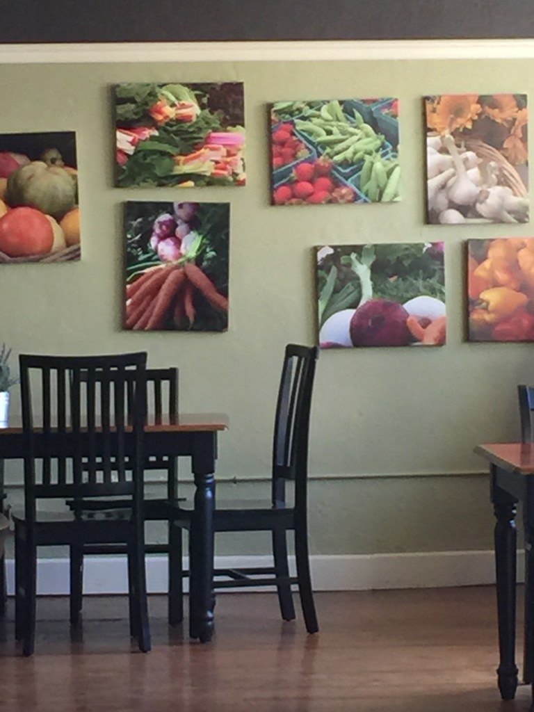 Or how about this corner?  I thought that the photographs of produce on canvas was very clever.  It'd be a neat way to decorate a breakfast nook!